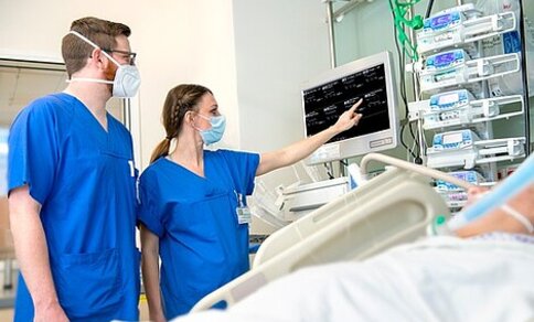 Medical staff in intensive care.